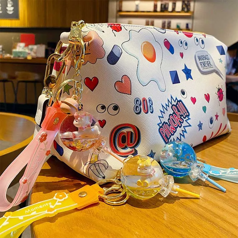 Креативный брелок для ключей с плавающим леденцом и зыбучим песком Мультяшные