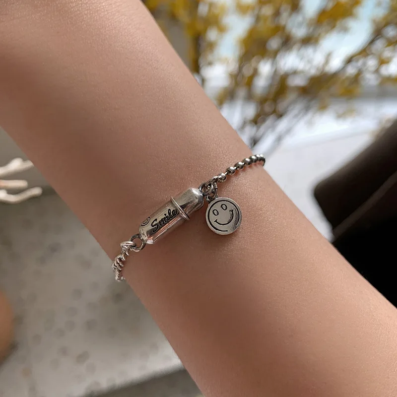 

Orgin Summer Unique Design Smile Face Capsule Pill Charm Bracelet for Women Temperament Metal Letter Bracelet Jewellery Hot