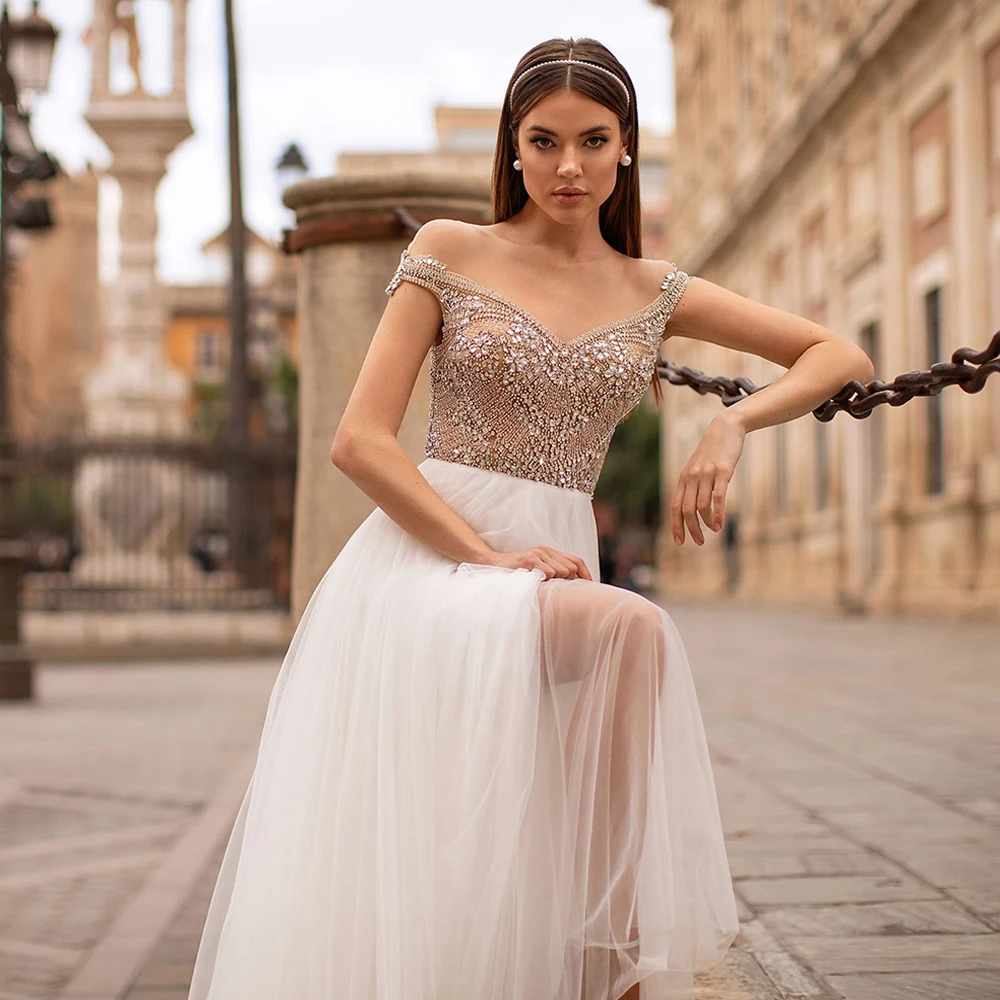 

Sparkling Crystals Wedding Dress Sexy Sheer Scoop Neck Beading Tulle A Line Sweep Train Bridal Gown Robe De Mariee