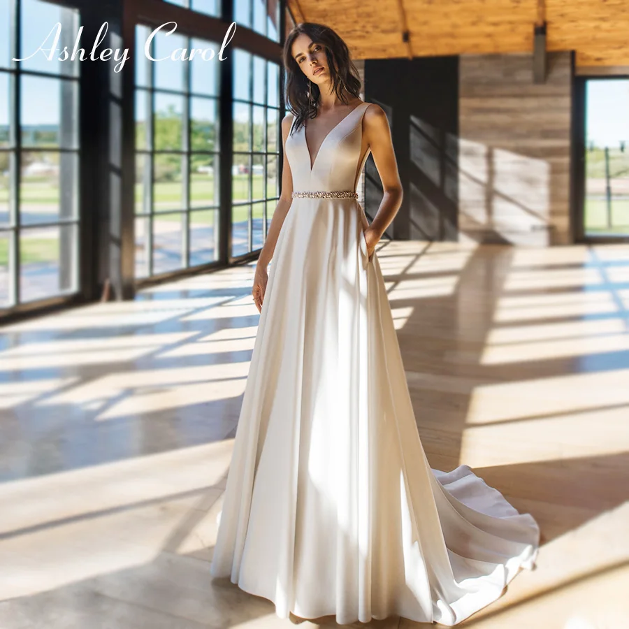 

Свадебное платье трапециевидной формы Ashley Carol, высокое качество, 2023, очаровательное атласное платье с v-образным вырезом, свадебные платья без спинки, украшенное кристаллами, с поясом, Vestidos De Novia