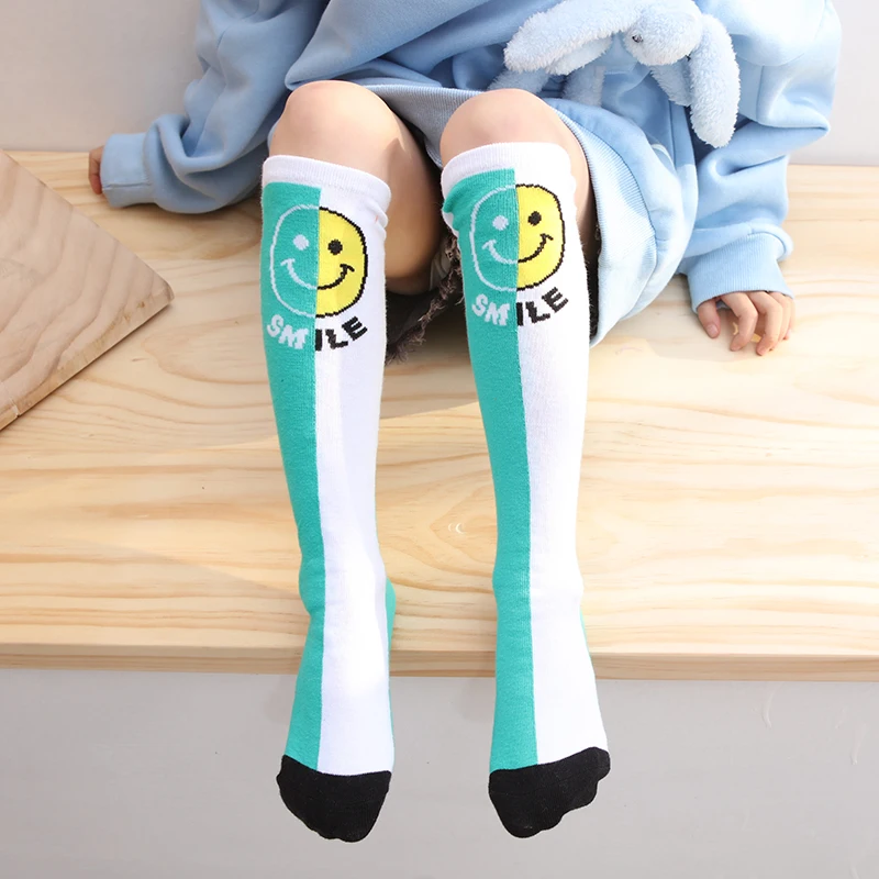 

New Fashion baby girls Spring Autumn keen high long socks warmer Contrast smiley face embroidery infant Kids Childre Calf Socks