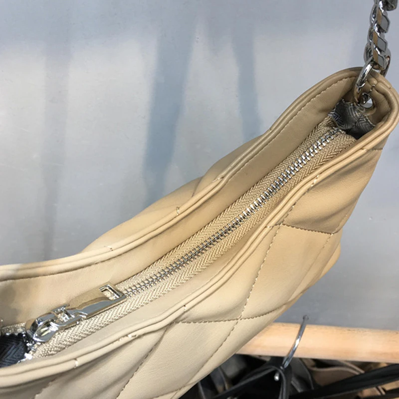 

Small synthetic leather bag with metal chain in 2021