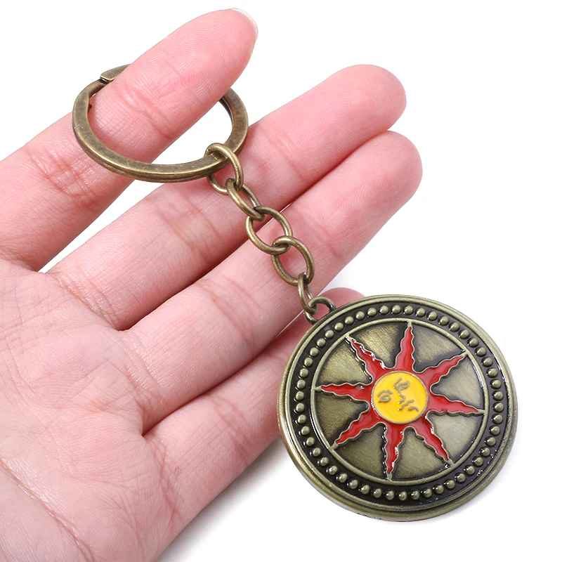 

SG New Badge Keychains High Quality Alloy Sun Knight Logo Pendants Keyring For Women Men Car Bag Cosplay Jewelry
