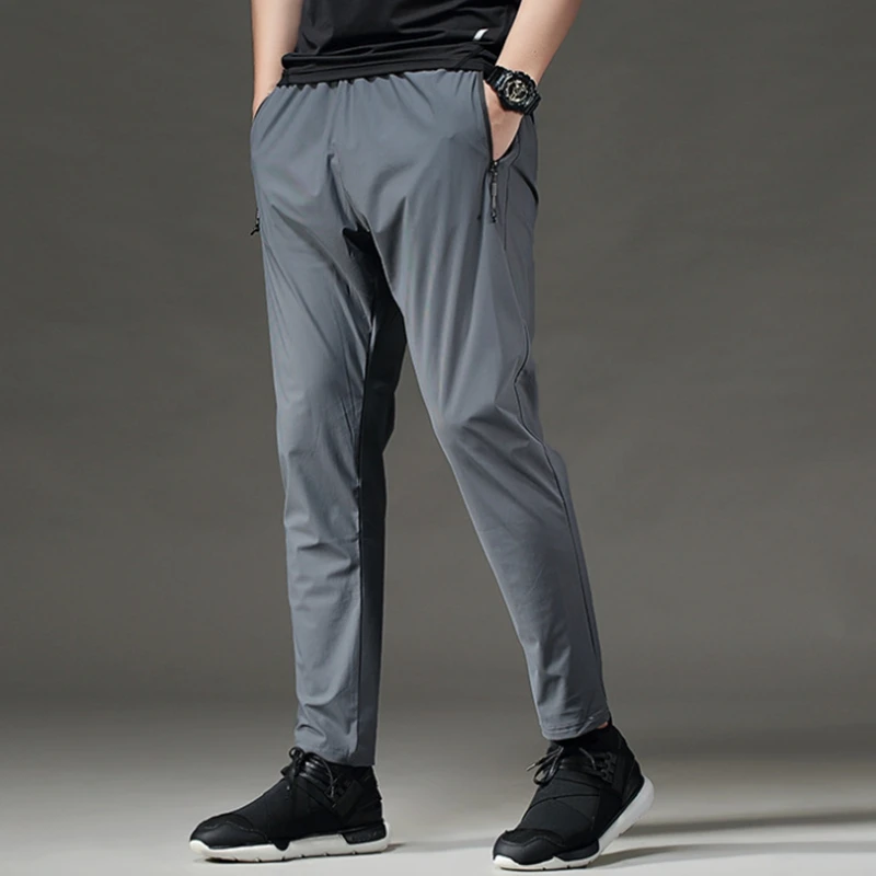 

Slim Fit Quick Dry Comfortable Joggers Men Running Long Pants Gym Sports Fitness Trousers Zip Pocket Thin Workout Sweatpants