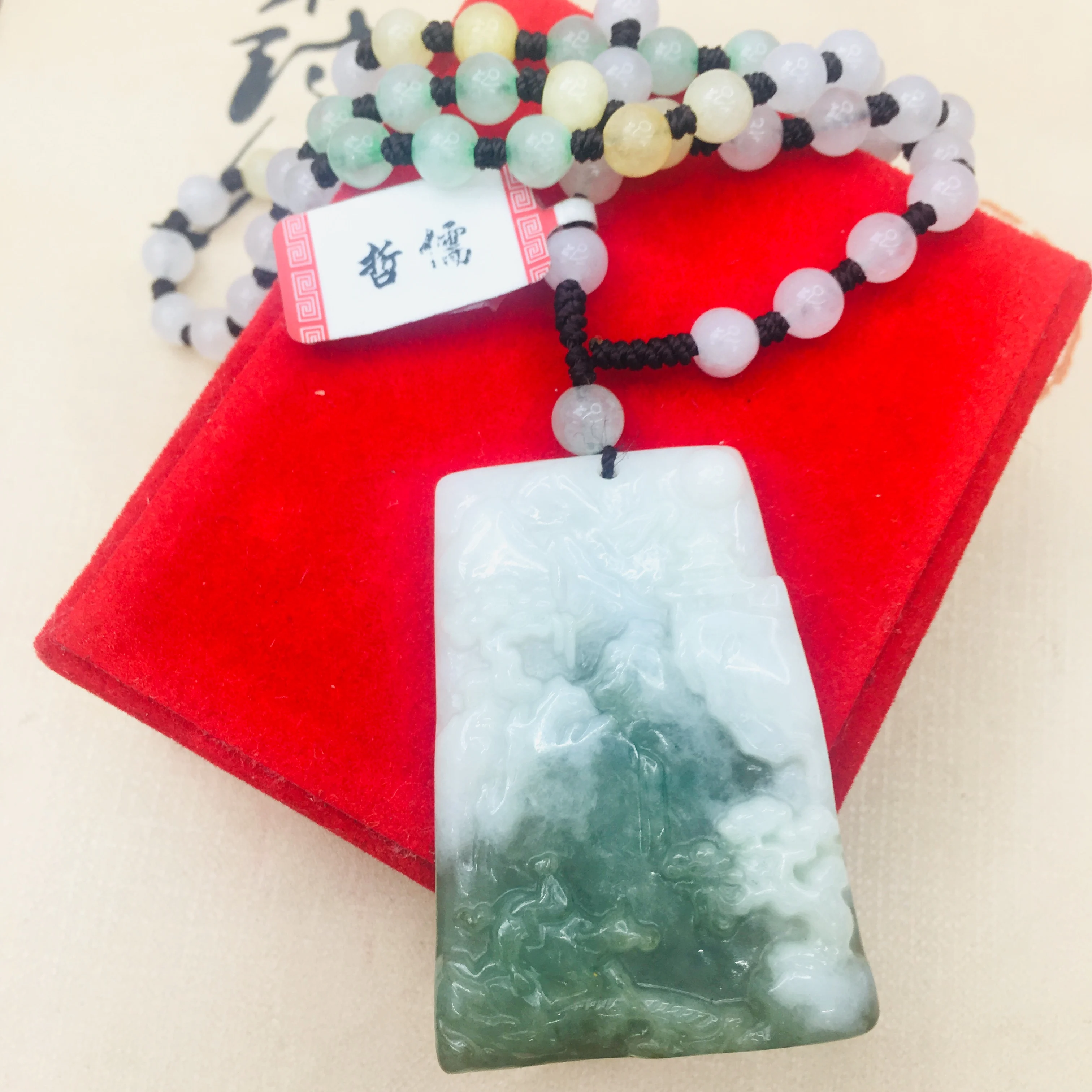 

Send A-level national certificate Natural Burmese jadeite carved two-color mountain and water pendant Three-color jade bead neck