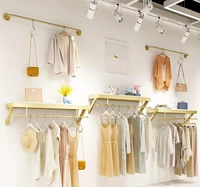 clothing store upper wall display rack simple wall mounted clothes hanger display rack for womens clothing store