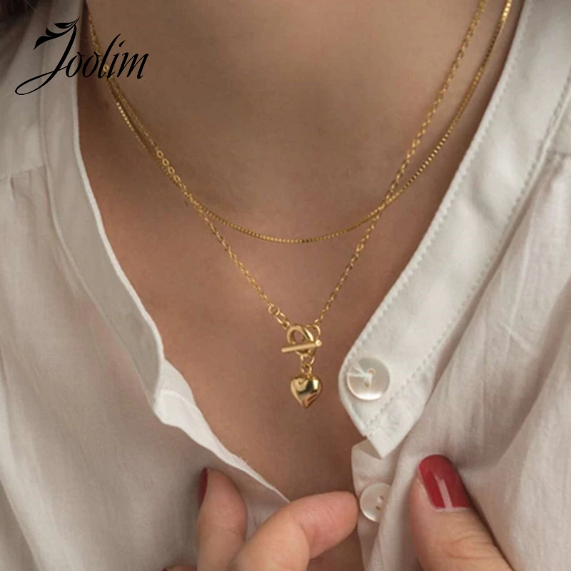 

Joolim Jewelry Wholesale Gold Finish Heart Pendant Necklace Toggle Necklace Stainless Steel Heart Necklace