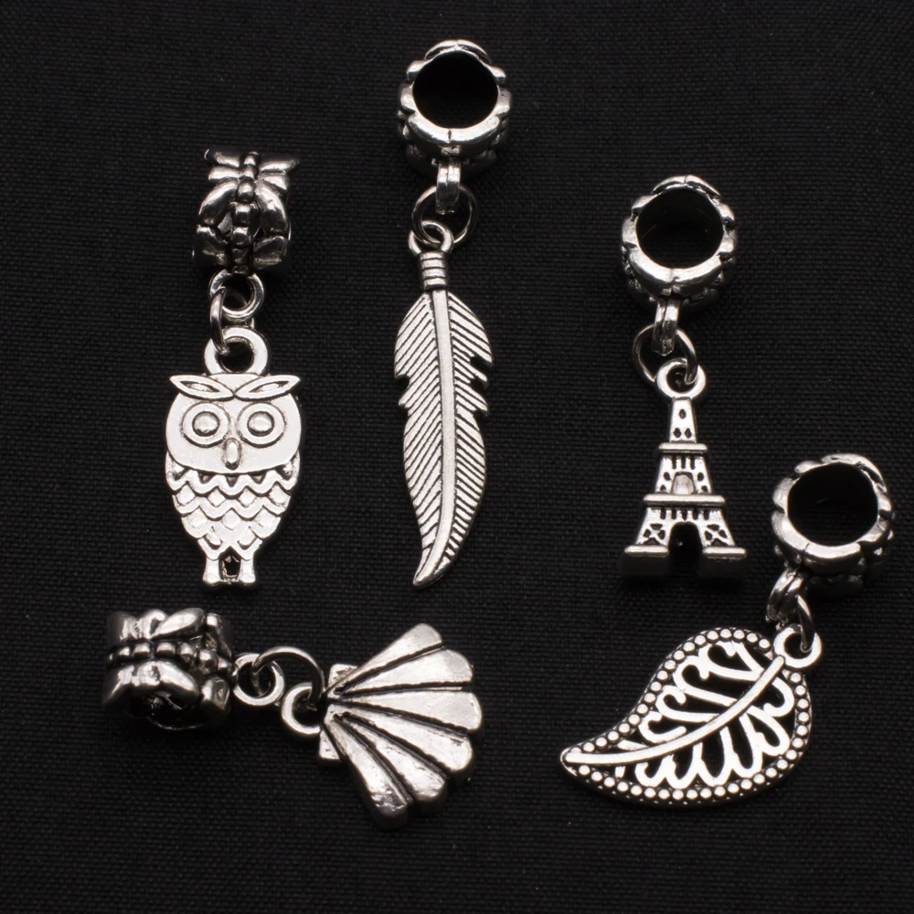 

10pcs/pack 2019 fashion explosion models Eiffel Tower pendant necklace jewelry owl leaves shell jewelry accessories