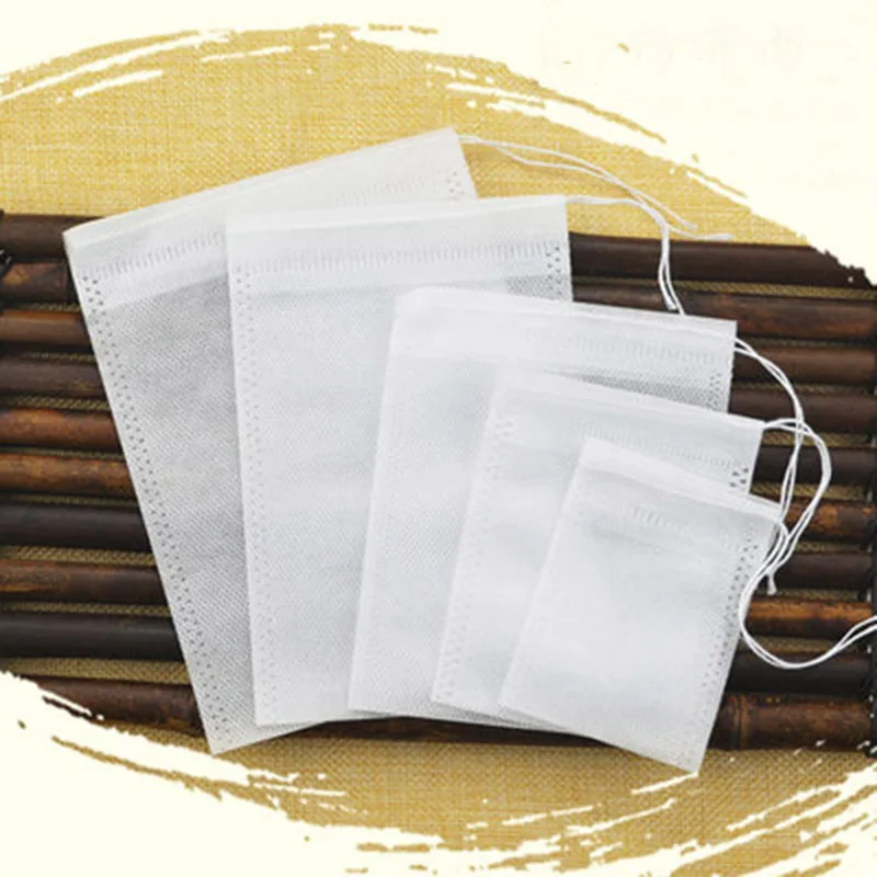 

Tea Bags 100Pcs/Lot Empty Scented Drawstring Pouch Bag 5*7CM Seal Filter Cook Herb Spice Loose Coffee Pouches Tools