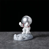 phone holder high quality anti scratch anti slip outer space themed astronaut statue for school phone stand phone rack
