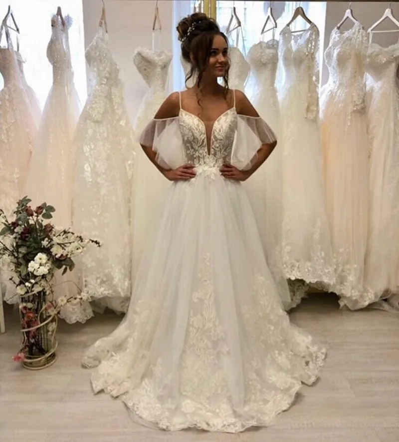 

2021 New Sexy Style Illusion Deep V Neck Wedding Dresses Spaghetti Straps Backless Lace Appliques Tulle A Line Vestido De Noiva