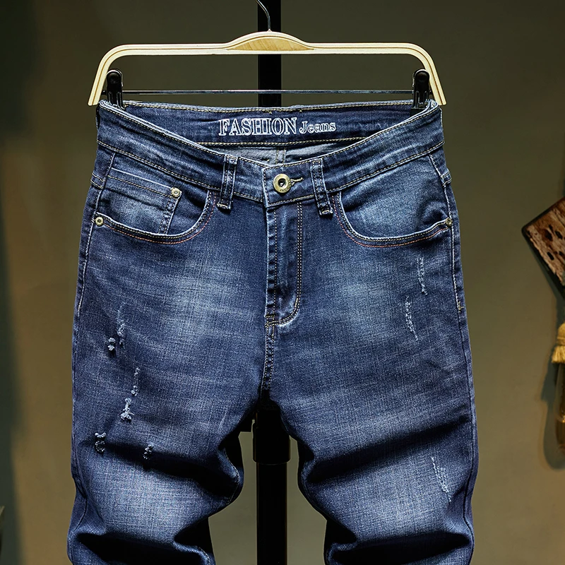 Мужские джинсы облегающие тянущиеся синие потертые рваные брюки мужские для