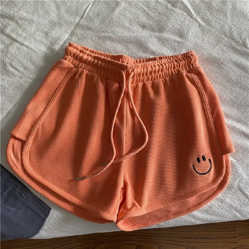 

The fabric is comfortable! Embroidered sports shorts women's new summer loose-fitting waist A-word wide-legged casual hot pants