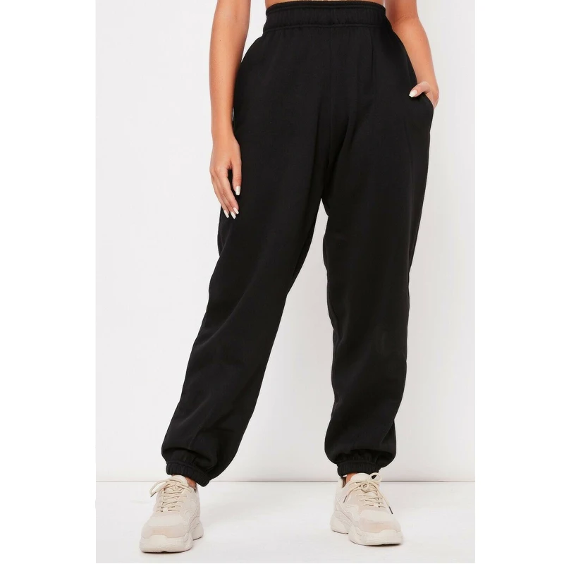 Женские флисовые спортивные штаны однотонные на завязках с двумя карманами