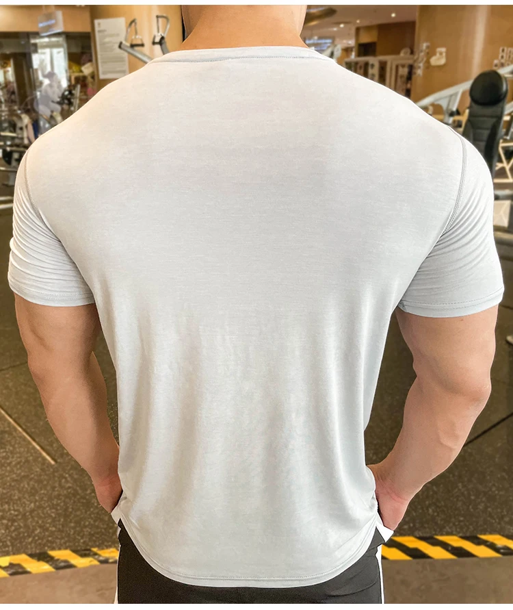 

2021 Sports Tee Men Fast Dry Breathable Silk cotton Running Fashion Shirts Traning Bodybuilding Man Fitness Short Sleeves