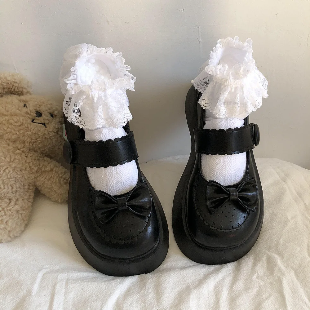 Женские лакированные туфли с бантом черные из лакированной кожи на платформе