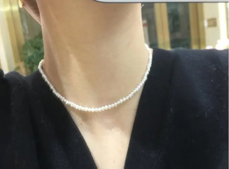 

Ожерелье-чокер женское с натуральным жемчугом, ожерелье из натурального пресноводного жемчуга ААА 3 мм яркого белого цвета с золотой застеж...