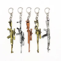 novelty weapon gun keychain cf ak47 gun mode pendant key chain chaveiro key holders key ring for mens gifts size 10cm