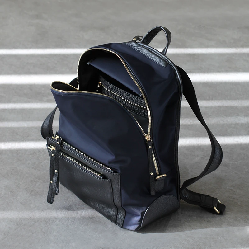 

Solid and lightweight backpack, waterproof nylon and leather, large-capacity travel bag, lady backpack