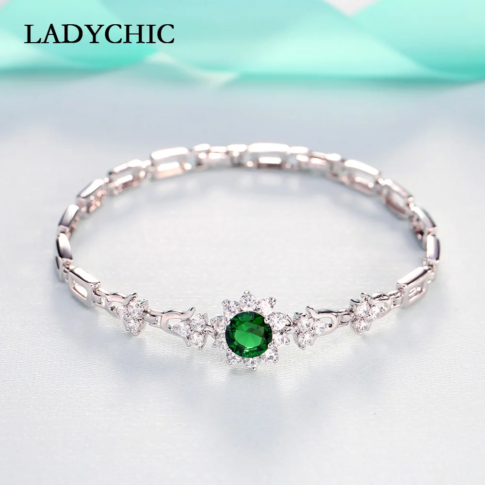 Женский браслет в виде цветка с кристаллами серебристого цвета|Цепочки и