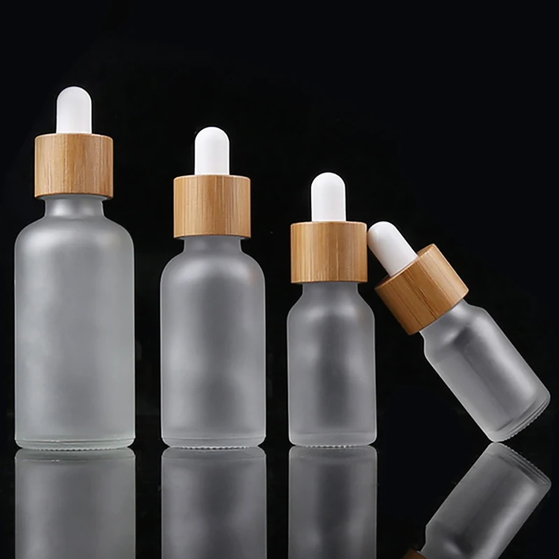 

6pcs/lot 5ml 10ml 15ml 20ml 30ml 50ml 100ml frosted dropper bottle with bamboo lid 1oz Pipette Bottles Refillable