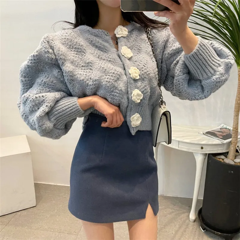 

2021 early spring floral button sweet hollow out knitted sweater legant termperament solid cardigan winter thicken crochet tops