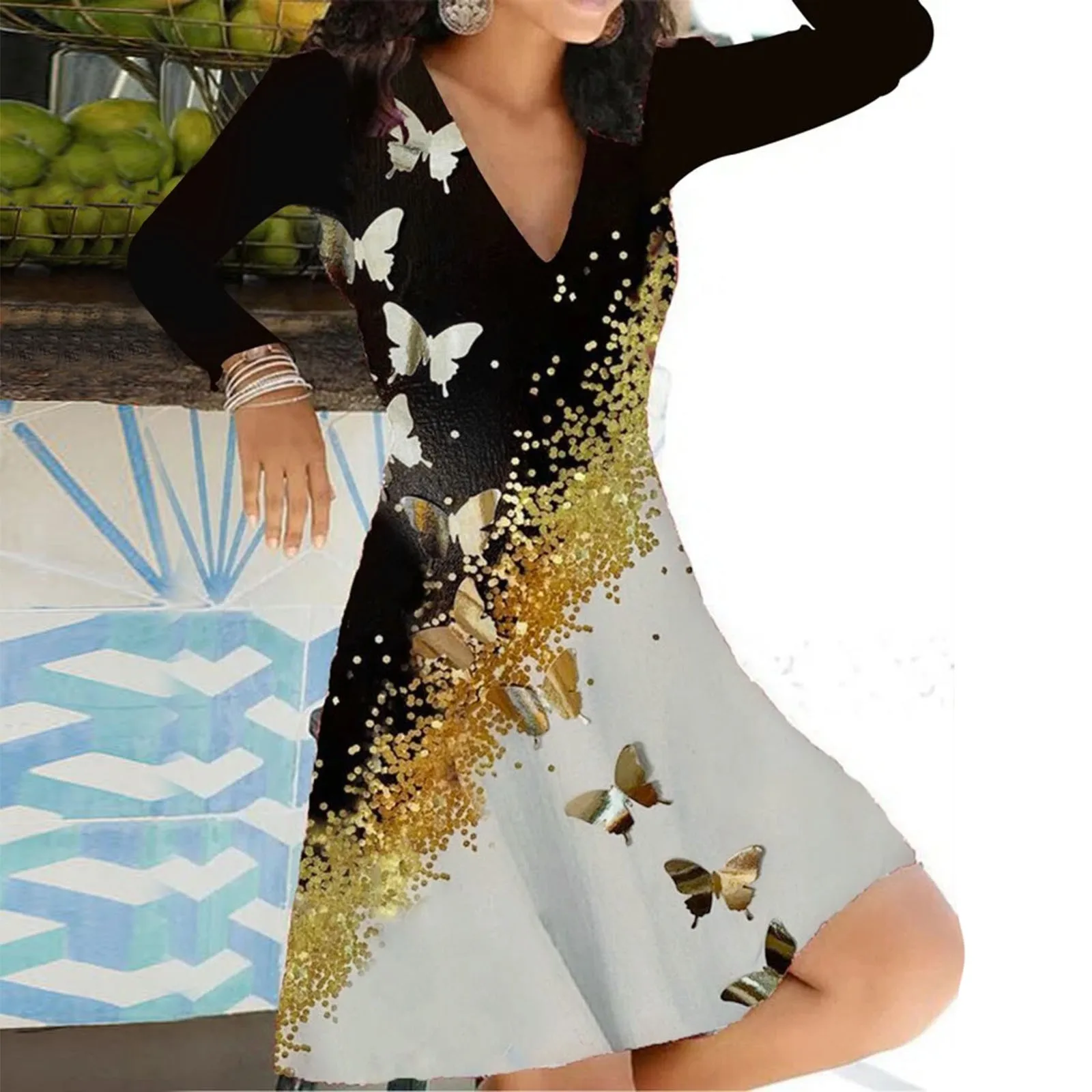 

Женское платье с длинным рукавом и V-образным вырезом