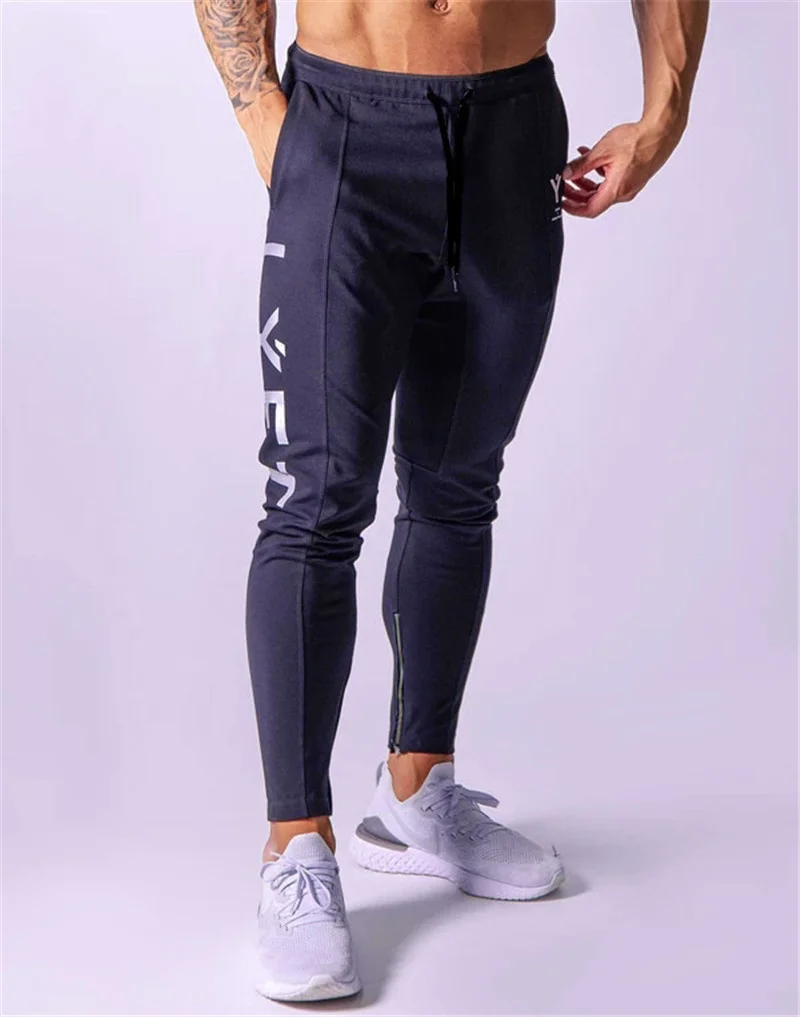 

New jogging men's sweatpants running gym pants down cotton hallways fine workout pants fitting muscle pants