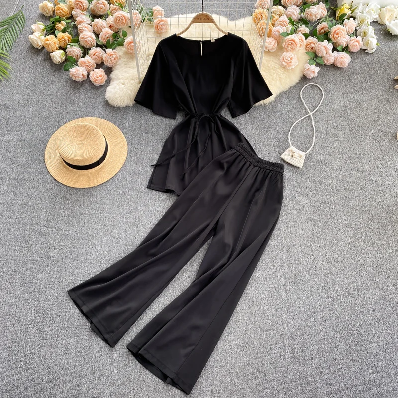 

Женский однотонный костюм с круглым вырезом, топ с коротким рукавом и брюки с широкими штанинами, костюм из двух предметов, модель DK245, 2021