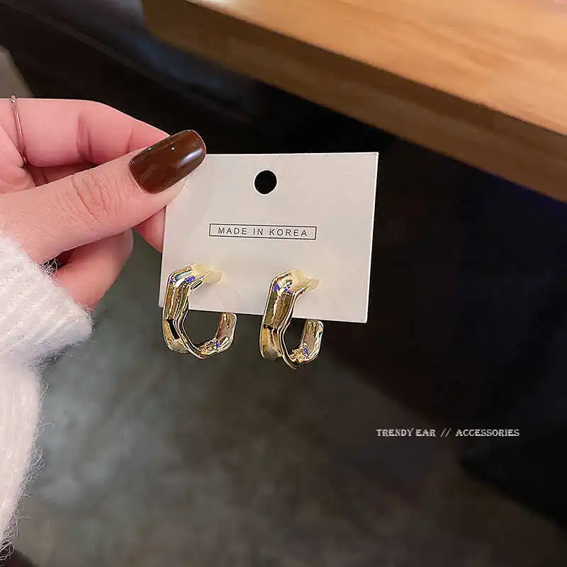 

S925 silver needle Japanese and Korean fashion semicircle Earrings simple temperament net red same metal Earrings Ear