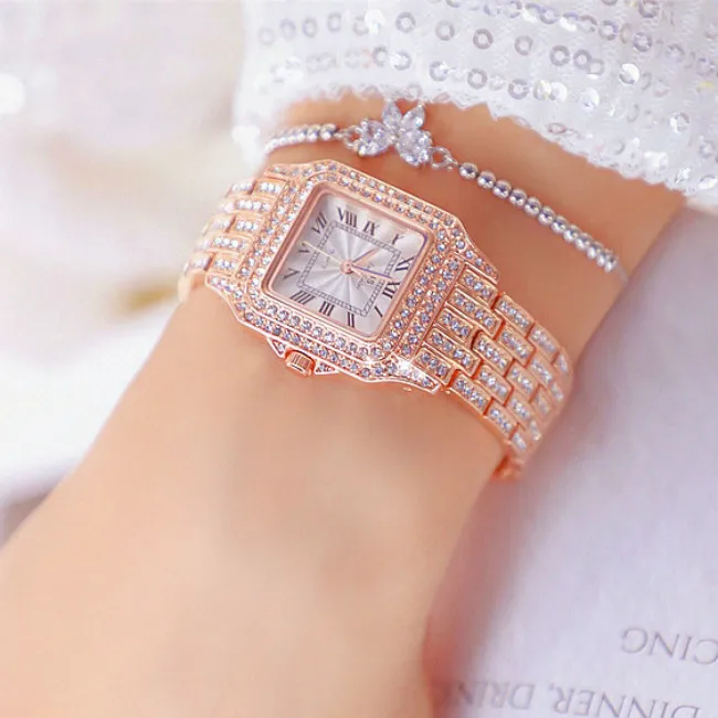 

Часы женские кварцевые аналоговые из розового золота с бриллиантами