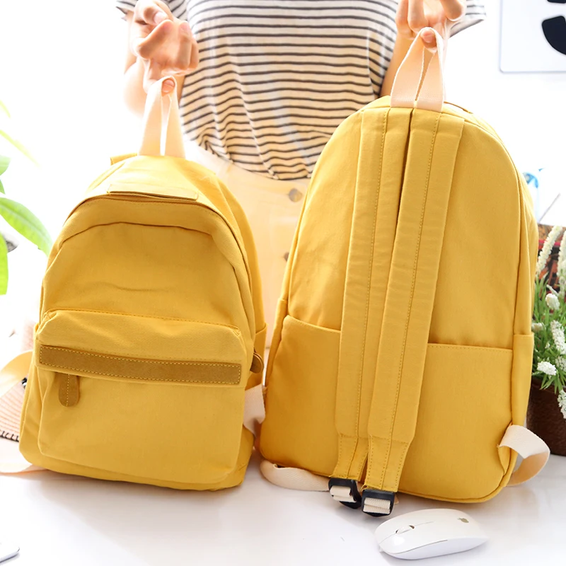 Женский малый свежий холст рюкзак женщин однотонный школьный рюкзак для подростков школьная сумка двух размеров путешествия плечевые сумки новые.