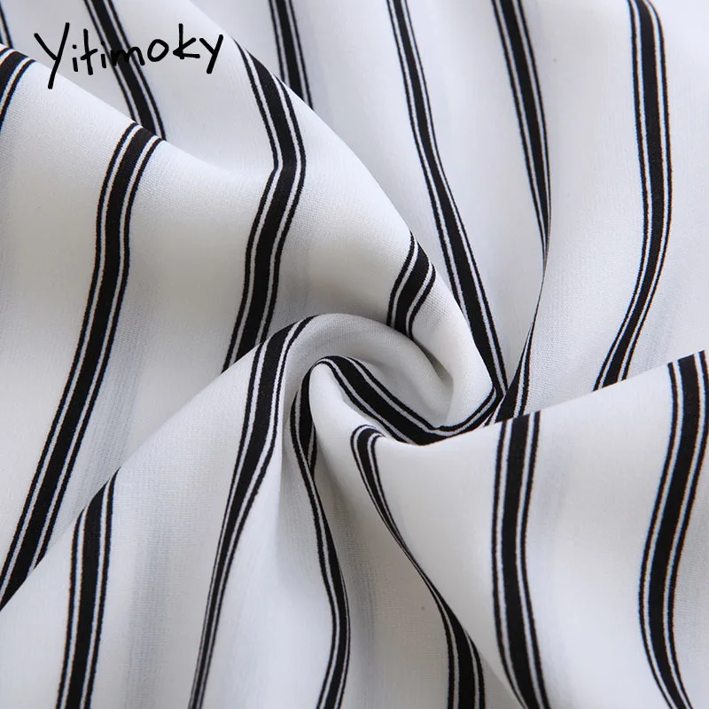 Весенние женские штаны с завязками на молнии черные полосатые белые высокой