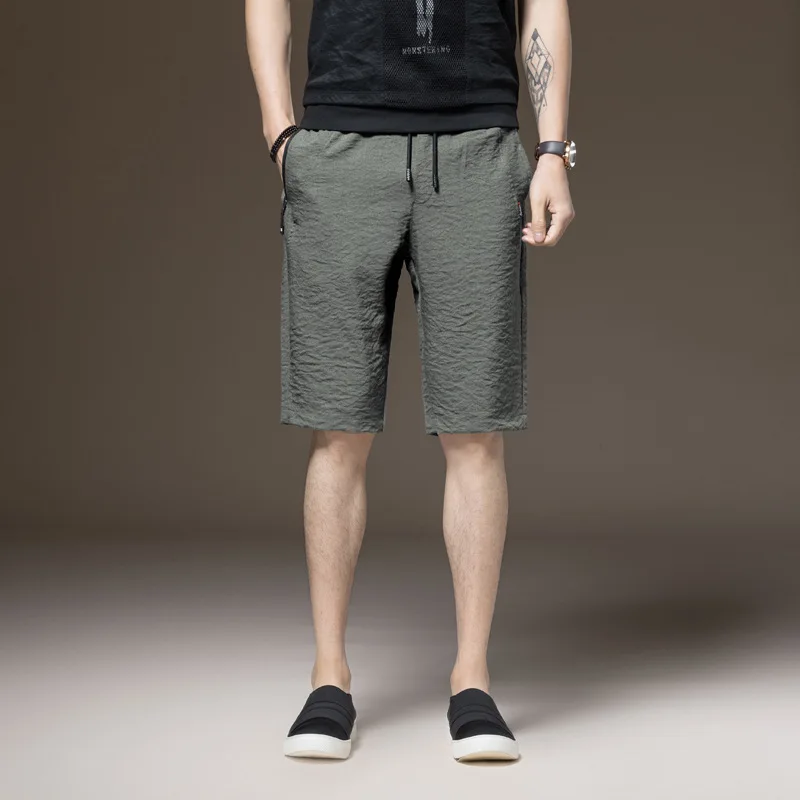 

Summer new style solid color casual shorts men's summer Capris loose pants half pants breeches zipper pocket fashion