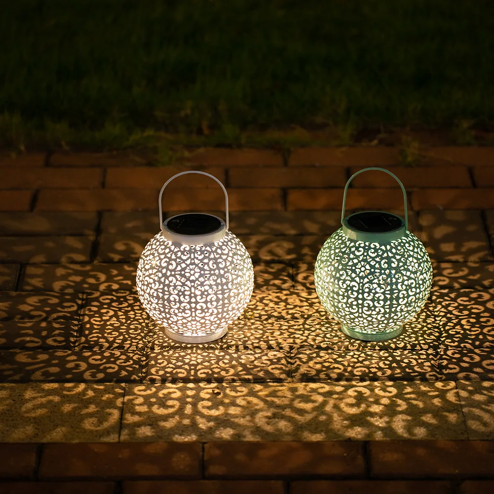 Guangdong solar iron lantern led iron hollowed out lantern courtyard garden decorative lamp LED small night lamp