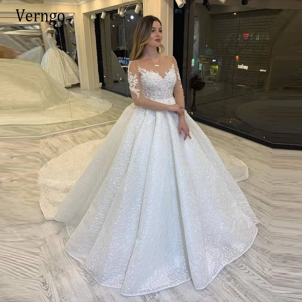 

Verngo 2021 New Modest Lace Applique Long Sleeves Wedding Dress Sheer Neck Glitter Skirt A Line Chapel Train Bridal Gowns