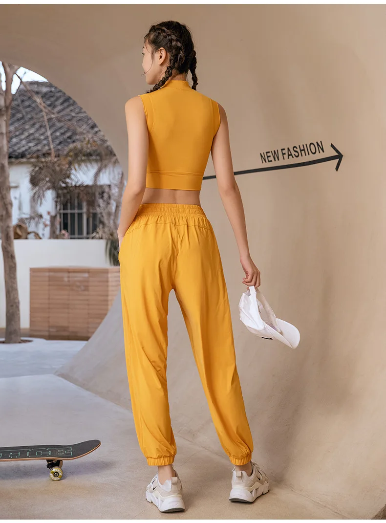 

2021 New Yoga suit European and American loose yoga pants running fitness top sports casual two-piece set gym set women