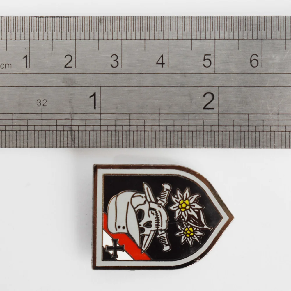 

WWII WORLD WAR 11 GERMANY EDELWEISS CAP BADGE SWORD SKULL CROSSED INSIGNIA-50064