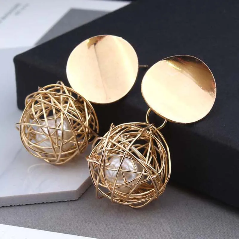 

Popular European and American retro geometric Earrings simple woven ball Pearl Earrings metal accessories women Korean tide