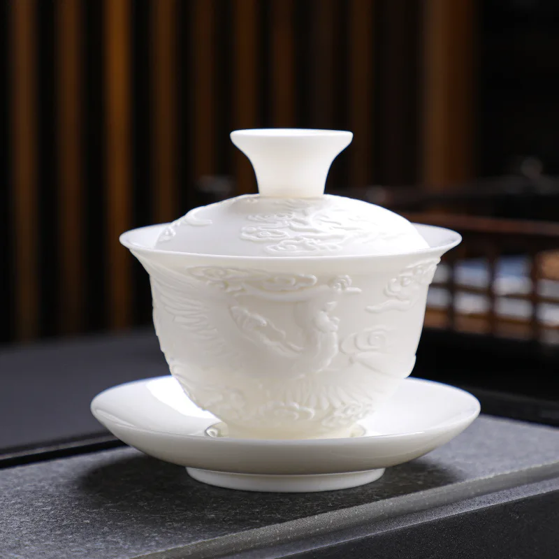 Suet Jade White Porcelain Dragon and Phoenix Relief Covered Bowl Tea Set Business Gifts Chinese Functional Tea Set Gaiwan images - 6