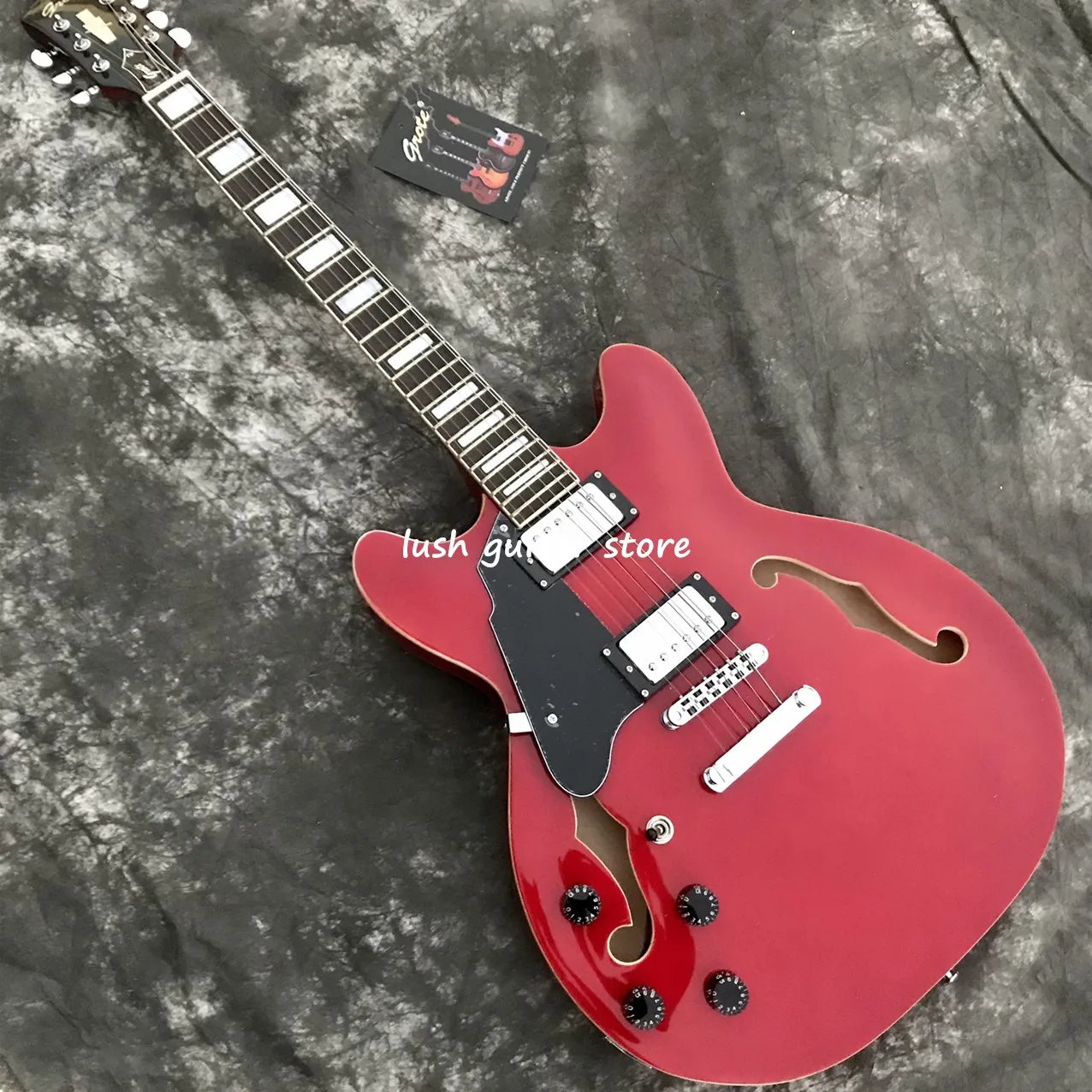 

Grote Lefthand Jazz Electric Guitar,China Red Semi-Hollow Body,Black Pickguard Guitarra,Free Shipping