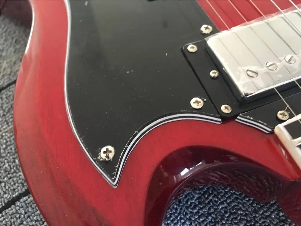 Китайский продукт Красная гитара Блочная инкрустация Бесплатная