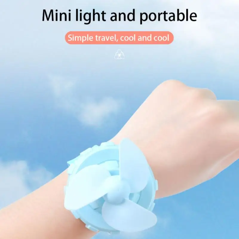 

2021 New 1PC Hot Sales Mini Portable Handheld Wrist Watch Fan Ultra-Quiet Electric Mini Watch Fans USB Charging Air Fan Kids Toy