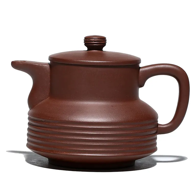 

purple clay teapot is pure handmade. The old purple clay teapot is famous for its collection of tea sets and teapots