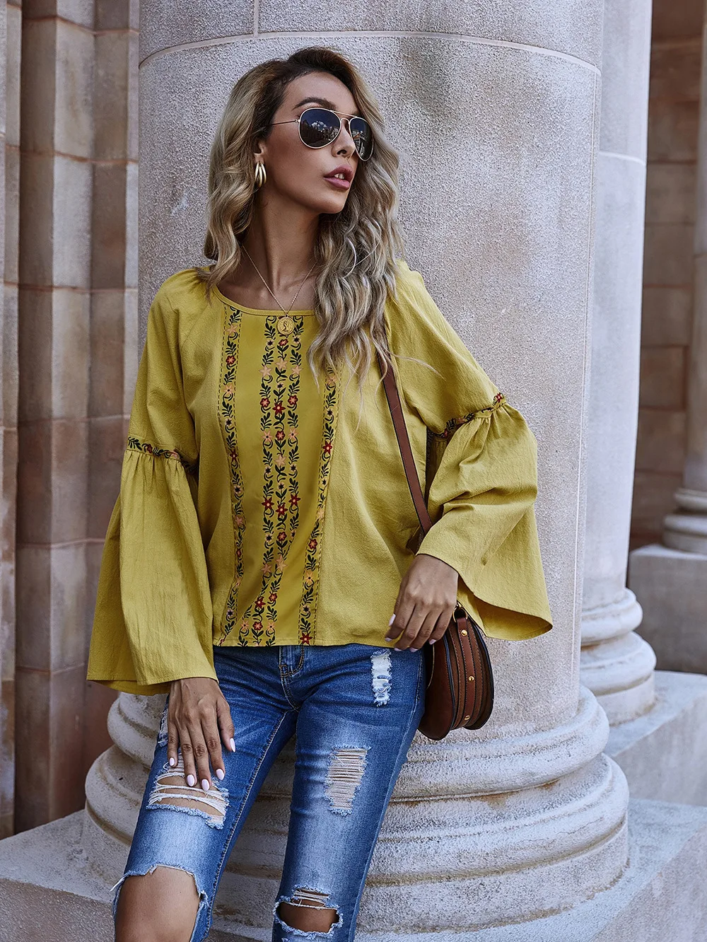 

2021 spring and summer European and American new solid color trumpet sleeve loose long-sleeved round neck top t-shirt