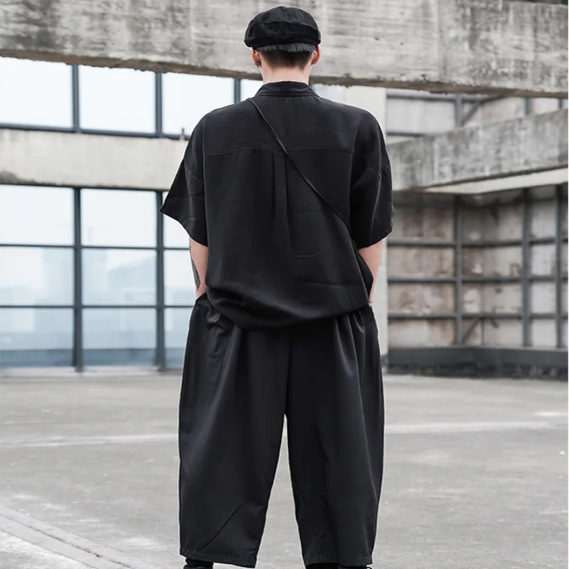 Рубашка Оригинального дизайна темная со свободными плечами с маленькой сумкой