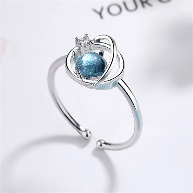 Новая коллекция изящных романтических регулируемых колец с голубыми планетами и