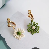 asymmetric green white daisy flower earrings for women cute metal flower clip on earring without piercing