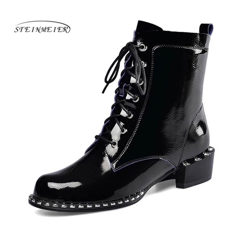 Женские зимние ботинки из натуральной кожи на шнуровке плоской подошве короткие