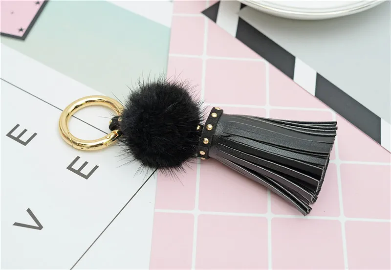 

Real Mink Fur Ball Key Chain With PU Leather Tassels For Women Bag Key Ring Holder Jewelry Pendant NEH812